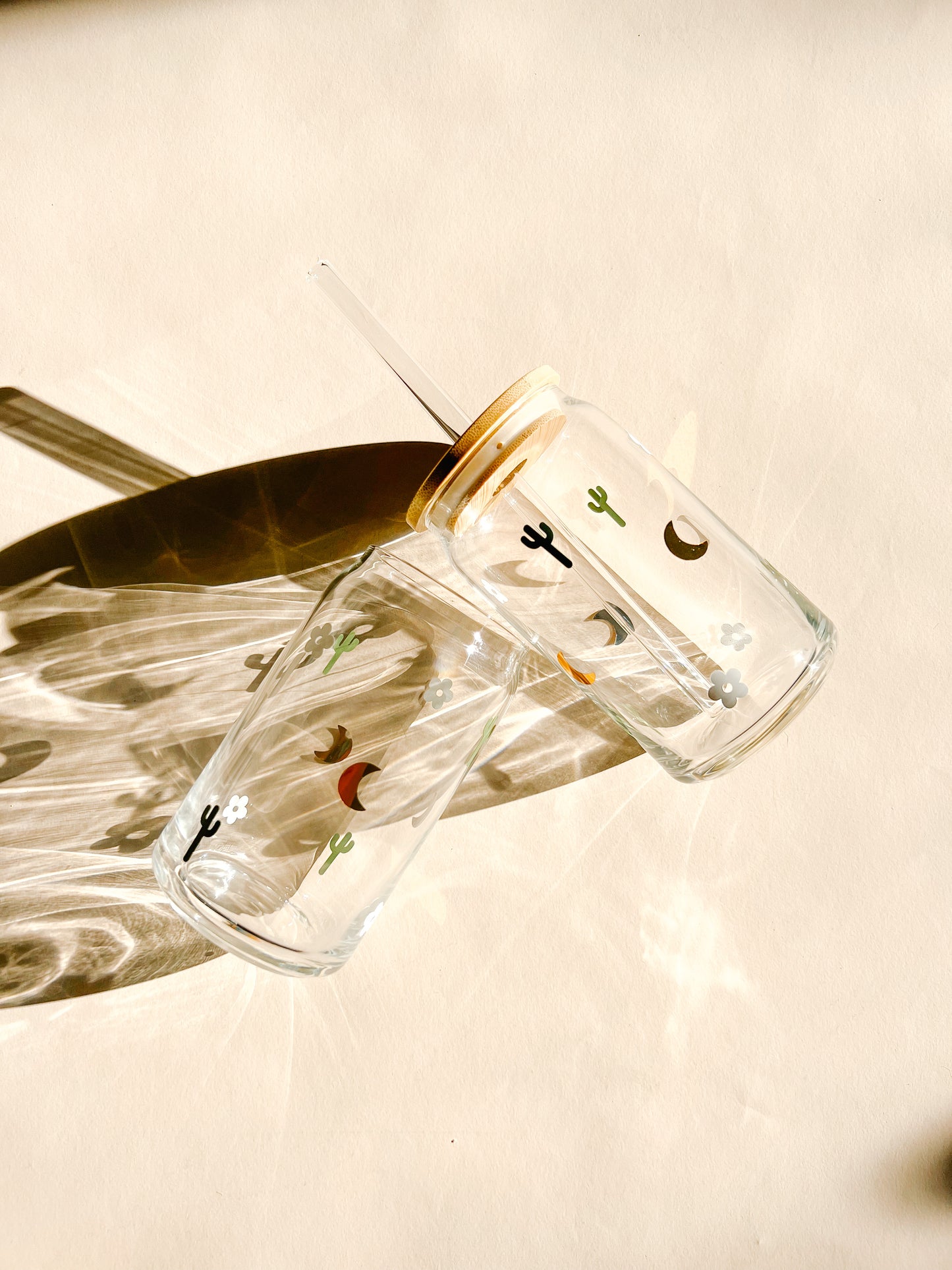 glass cup with bamboo lid and straw boho design cactus flower and moon neutrals