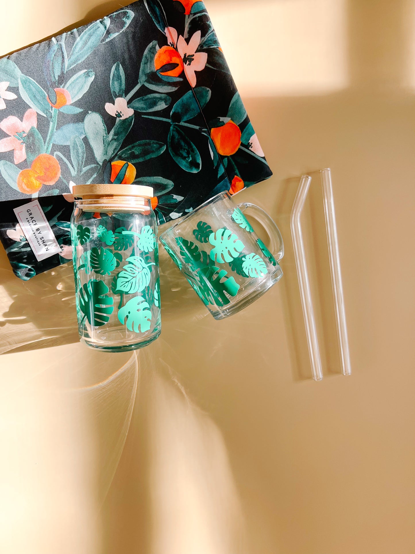 monstera plant leaf glass cup and coffee mug