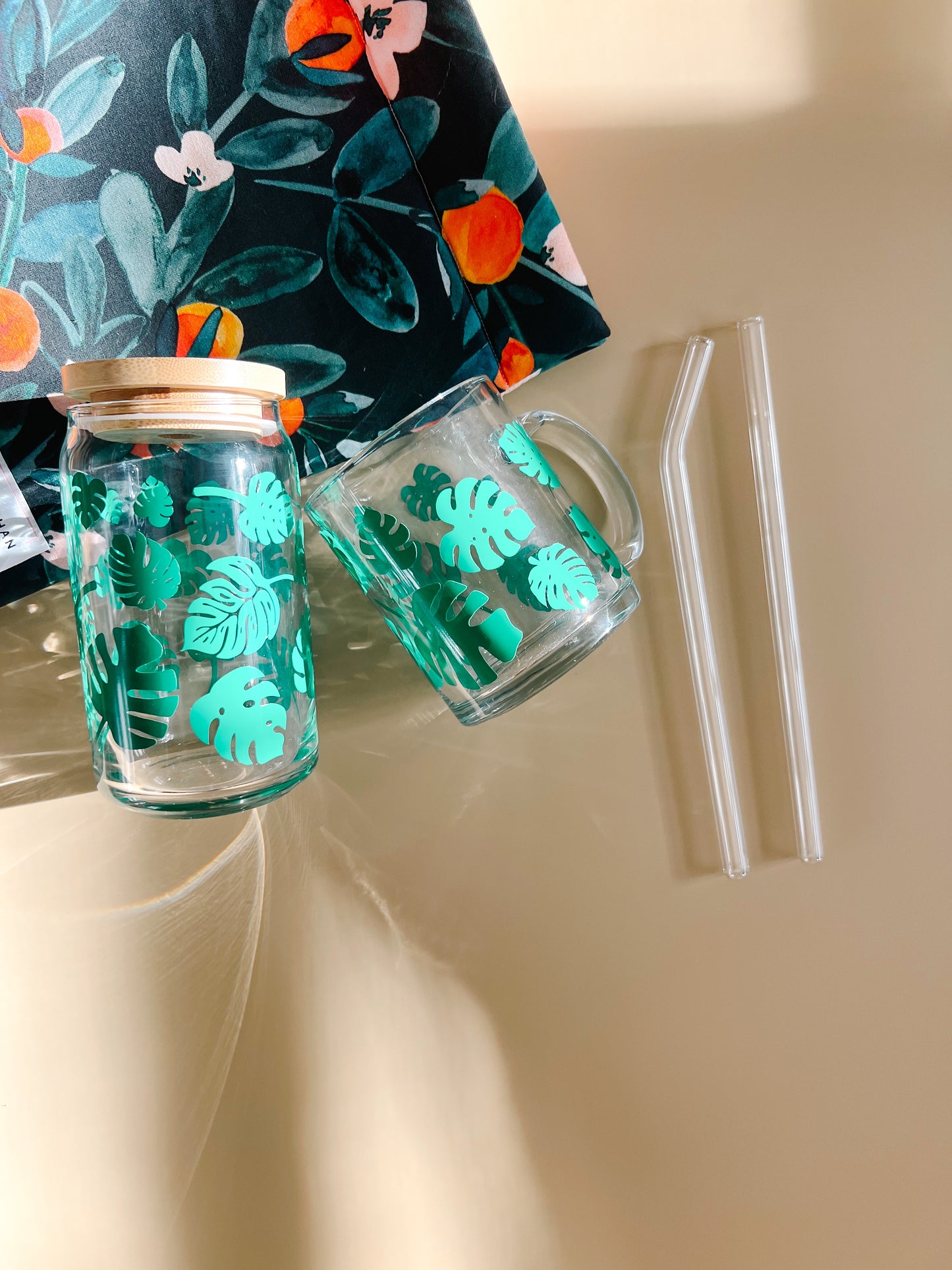 monstera plant leaf glass cup and coffee mug