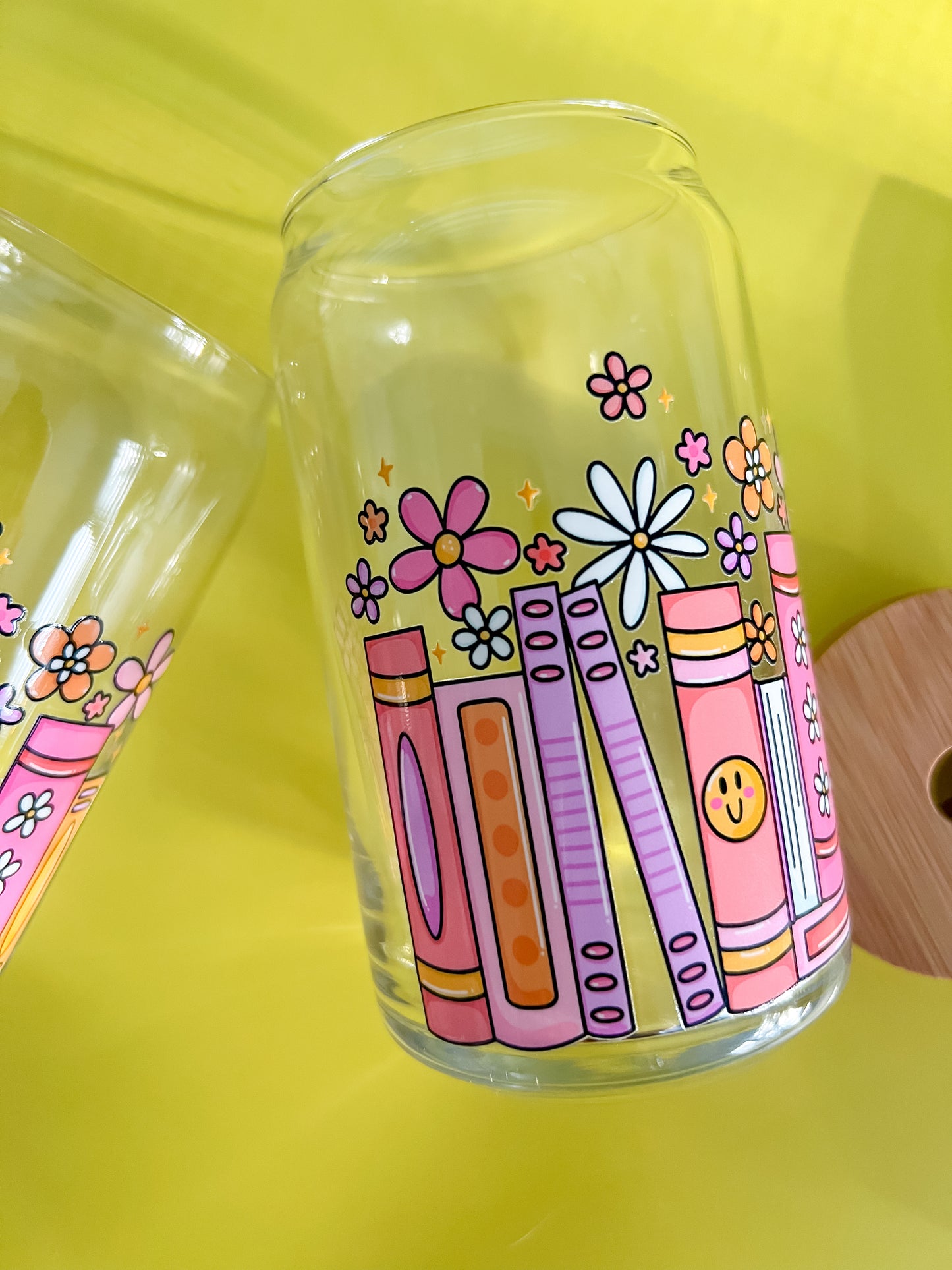 Happy Books and Flowers 16oz glass cup with glass straw and bamboo lid whimsical pink books white and yellow flowers